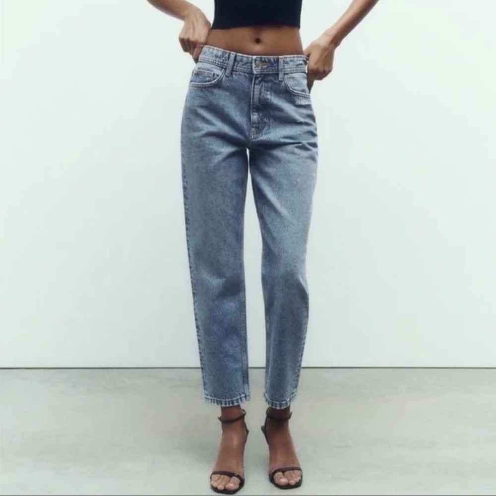 Zara Women's high-rise mom fit jeans in a medium wash